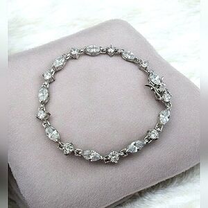 Elegant SLC Signed Sterling Silver Tennis Bracelet with Marquise & Round Cut CZ